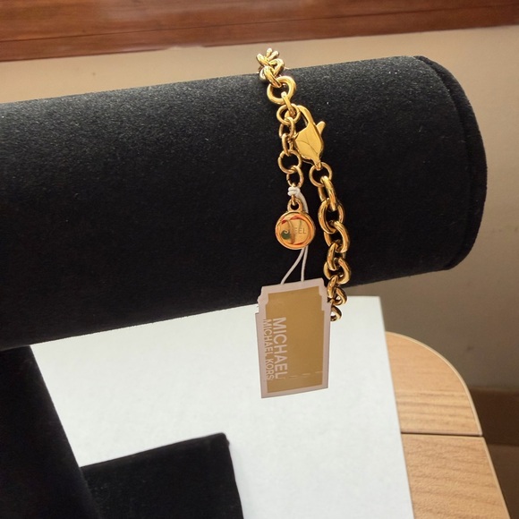 Michael Kors Gold-Tone Chain Bracelet with Logo Charms - Picture 13 of 15